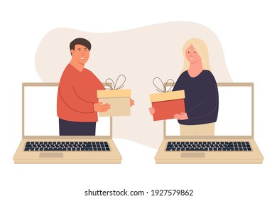 happy people. Give each other gifts. A woman gives a man a gift via laptop. The guy gives the girl a present. Holiday surprise. Celebrating Christmas. Charity. Couples giving and holding presents