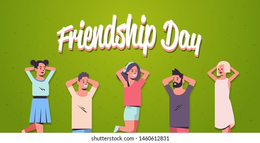 happy people group lying on grass young friends having fun together friendship day celebration concept flat horizontal portrait