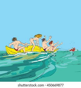 happy people having fun on banana boat