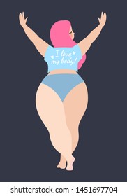Happy plus size girl posing in a T-shirt with the inscription: I love my body. Happy body positive concept. Different is beautiful. Attractive overweight woman. For Fat acceptance movement no fobia.