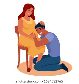 happy pregnant woman holds her husband's hand on her stomach so that he can feel the fetal movement