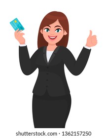 Happy, professional business woman showing/holding credit/debit/ATM banking card and gesturing/making thumbs up sign. Good, like, deal, agree, positive concept in cartoon. Modern lifestyle.