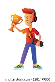 Happy professional eSports Gamer holds a cup and a keyboard in hands standing on a white background. Player rejoices victory. Boy with headphones.