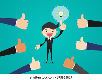 Happy and proud businessman get ideas for business with many thumbs up hands around him.
