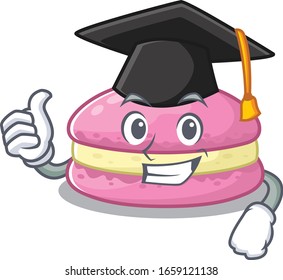 happy and proud of strawberry macarons wearing a black Graduation hat