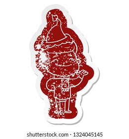 happy quirky cartoon distressed sticker of a man wearing santa hat