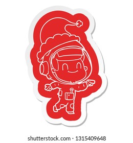 happy quirky cartoon  sticker of a astronaut man wearing santa hat