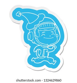 happy quirky cartoon  sticker of a astronaut wearing santa hat
