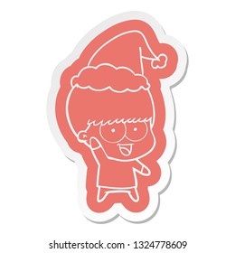 happy quirky cartoon  sticker of a boy waving wearing santa hat