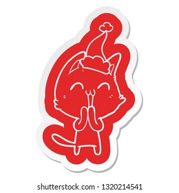 happy quirky cartoon  sticker of a cat wearing santa hat