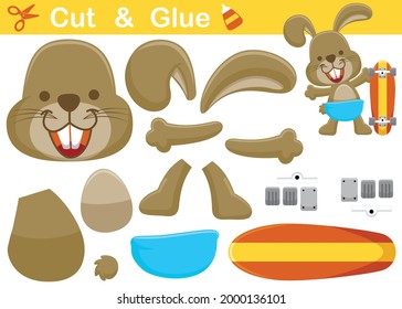 Happy rabbit with skateboard. Education paper game for children. Cutout and gluing. Vector cartoon illustration