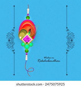 Happy Raksha Bandhan Greeting Card with Beautiful Rakhi on Blue Background.