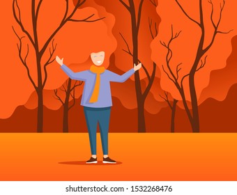 Happy red-haired young woman in autumn park or forest with combination of hair curls and tree crown