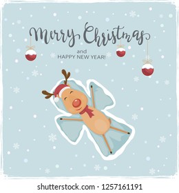 Happy reindeer with Santa's hat make a snow angels. Lettering Merry Christmas with balls on snowy background, illustration.