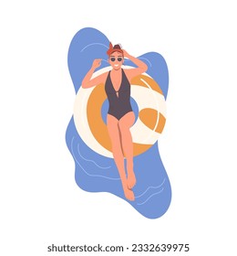 Happy relaxed woman floating in inflatable rubber ring in swimming pool or sea ocean water
