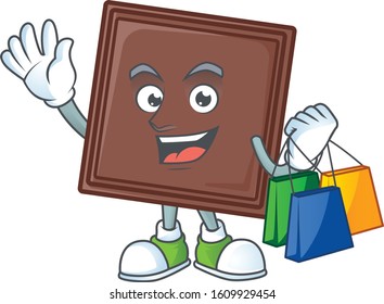 A happy rich one bite chocolate bar waving and holding Shopping bag