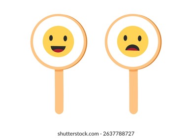 Happy and sad emoji signs on round paddles