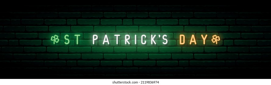 Happy Saint Patrick’s Day neon signboard. Glowing  St. Patrick’s Day inscription on dark brick wall background. Stock vector illustration.
