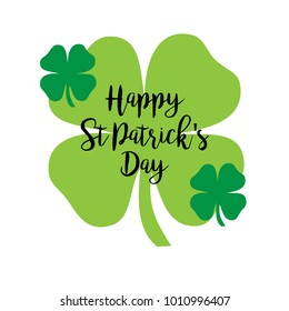 happy Saint Patricks day calligraphy with shamrocks