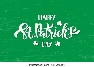 Happy Saint Patricks day celebration text with shamrock. Hand drawn brush lettering for greeting card, banner, invitation, postcard, flyer, poster. Vector illustration on green texture background