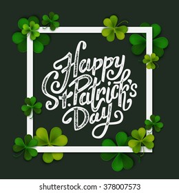 Happy Saint Patrick's day handwritten message, brush pen lettering on green shamrock background in square frame, postcard, vector illustration