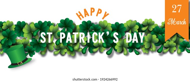 Happy Saint Patrick's Day letters, high hat and the day of event's ribbon on shamrock plants and white background. Saint Patrick's Day greeting card in vector design