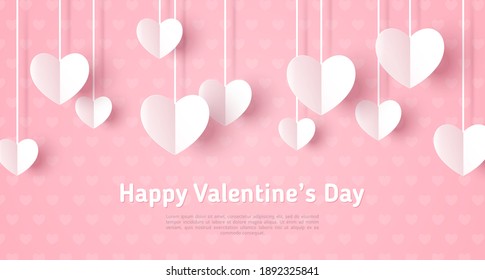 Happy Saint Valentine's day card, hanging white paper cut hearts on pastel pink background. Place for text. Decorative holiday banner, festive web poster, romantic flyer, brochure.