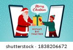 Happy Santa Claus giving a virtual gift to a boy on a video call on smartphone, distant but together Christmas card