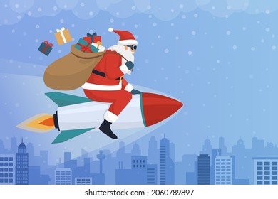 Happy Santa Claus riding a rocket over the city and carrying Christmas gifts in his sack