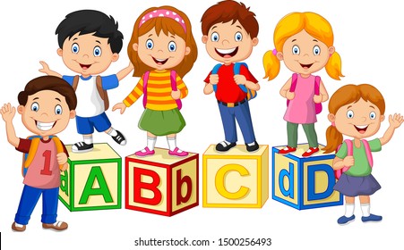 Happy school children with alphabet blocks