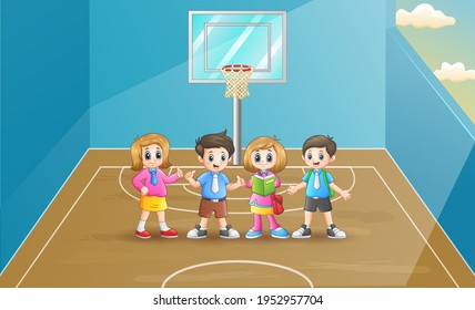 Happy school children in the basketball court