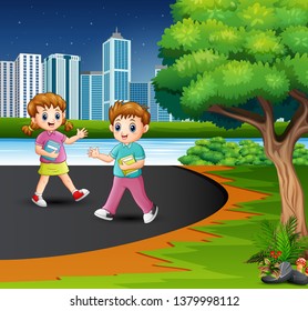 Happy school children are walking on the road