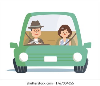 Happy senior couple in car on road trip