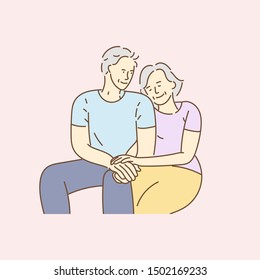 Happy senior couple, 
lovely elderly couple in each other's arms, sitting on sofa, enjoying, hugging and smiling. Hand drawn vector illustration in doodle style