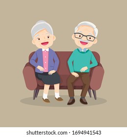 Happy senior man woman family sitting on the sofa and rest,Happy elder couple sitting,Elderly couple husband and wife sitting on couch embracing