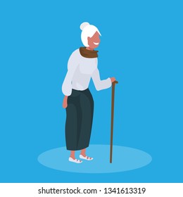 happy senior woman standing with walking cane female elderly cartoon character full length blue background flat