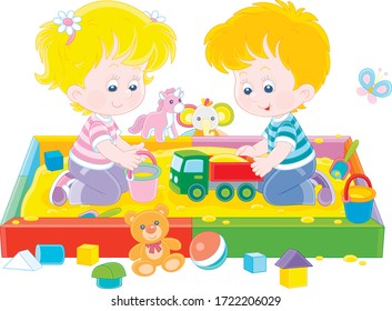 Happy small children friendly smiling, romping and playing with their colorful toys in a sandbox on a playground in a summer park, vector cartoon illustration