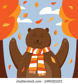 Happy smiling bear in a cozy scarf enjoying the fall of the leaves in autumn forest under the blue sky with clouds. Vector illustration for card, flyer, printing in yellow, red, blue and brown colors.