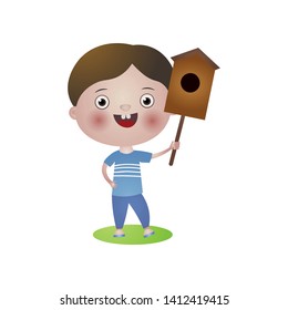 Happy smiling boy take in hand bird wood house