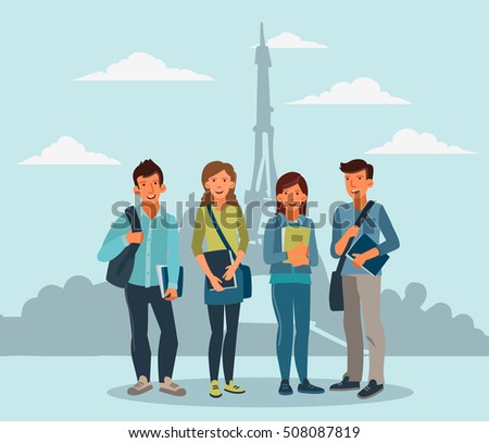 Happy and smiling group of students standing with notebooks in Paris with the Eiffel Tower in the background