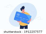 Happy smiling man hugging big credit card. Flat modern concept vector illustration of people who use credit and debit bank card for payment and banking. Casual consumer with card on white background