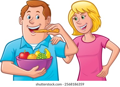 Happy and smiling middle aged man eating a carrot and holding a big bowl of fruit with his smiling wife looking on with her hand on his shoulder.