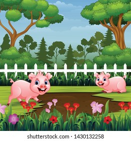 Happy smiling pigs are playing in the mud