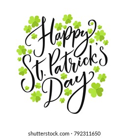 Happy St. Partick's day greeting. Calligraphy design for cards. Typography on white background with green four-leaf shamrocks