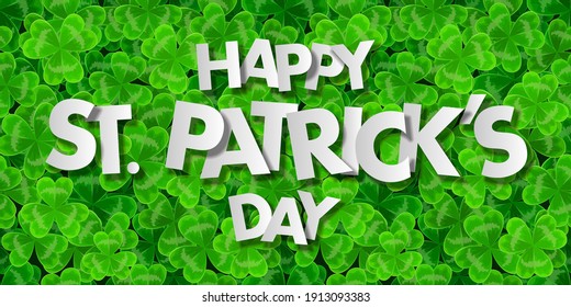 Happy St. Patrick's day banner. Green clover Shamrock background. 