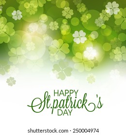 Happy St. Patrick's Day celebration greeting or invitation card decorated by shiny shamrock leaves.