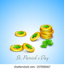 Happy St. Patrick's Day celebration with gold coins and shamrock leaves on blue background.