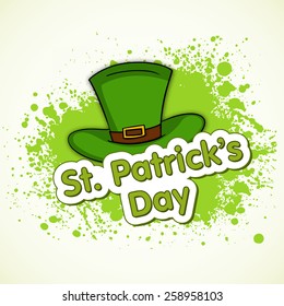 Happy St. Patrick's Day celebration with leprechauns hat on green color splash background.