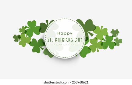 Happy St. Patrick's Day celebration sticker, tag or label design with shamrock leaves on grey background.