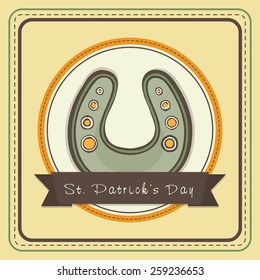 Happy St. Patrick's Day celebration greeting card design with horseshoe.
